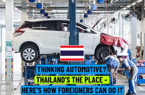 Automotive workshop in Thailand with a white car lifted for maintenance, two mechanics working, and a Thailand flag overlay with text promoting automotive business opportunities for foreigners.